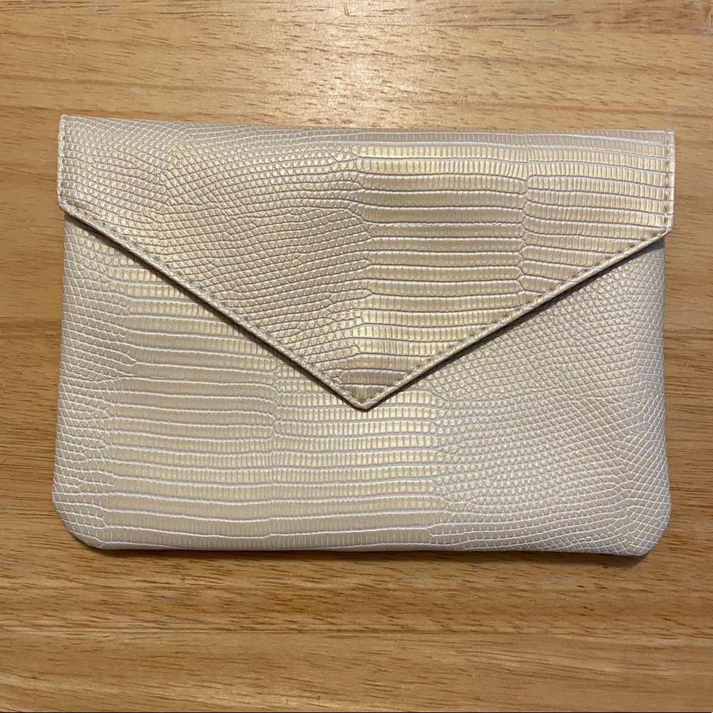 August Ipsy snakeskin cosmetic bag